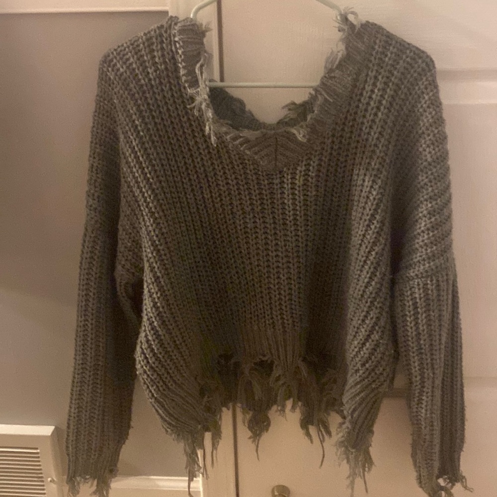 Medium, grey sweater with a little damage